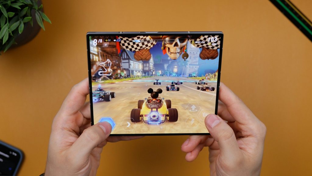 a-person-holding-a-video-game-in-their-hands